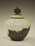 raku pot with leaf